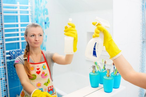Carpet cleaning team preparing equipment with safety measures in place